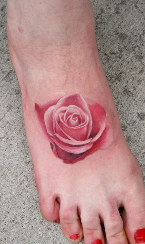 Amazing Pink Rose Tattoo On Girl Foot