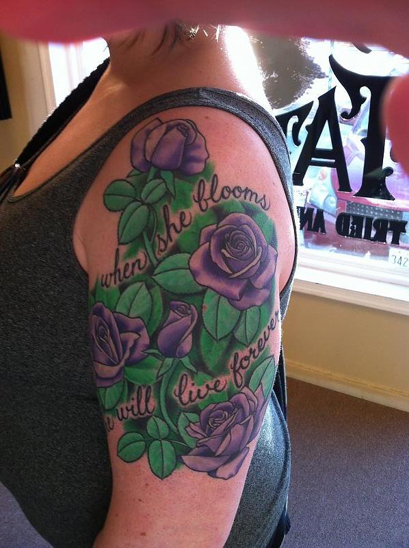 Amazing Purple Roses With Leaves Tattoo On Girl Left Shoulder