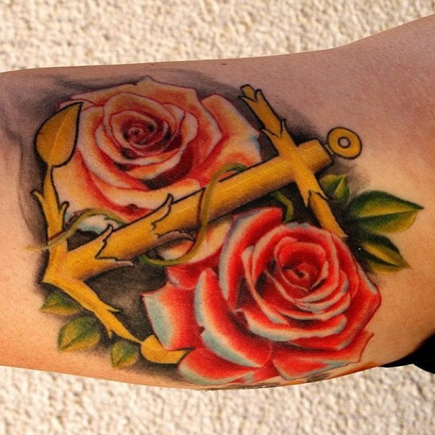 Amazing Red And Orange Roses With Anchor Tattoo On Bicep