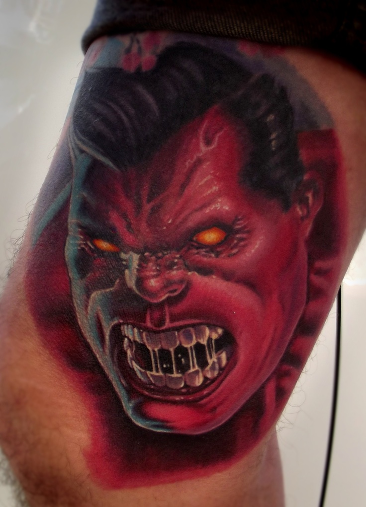 Amazing Red Hulk Face Tattoo On Thigh