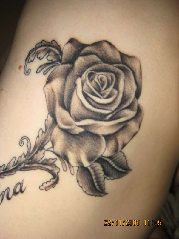 Awesome Black Ink Rose Tattoo Design