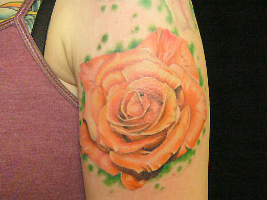 Awesome Orange Rose Tattoo On Girl Left Shoulder