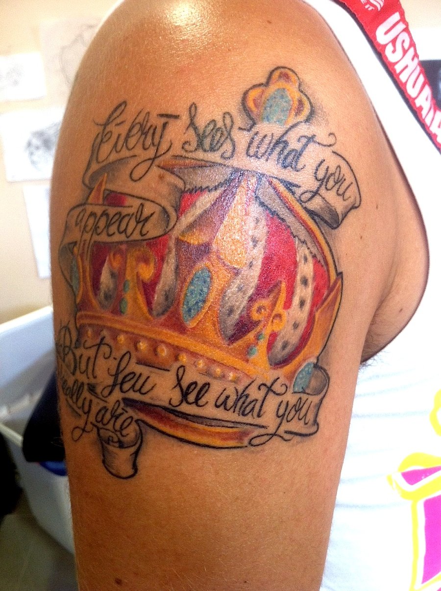 Awesome Queen Crown With Banner Tattoo On Shoulder By Adrian Ciercoles