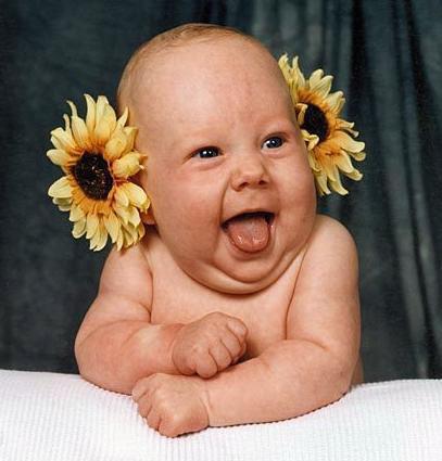 Baby With Flower Ears Funny Picture