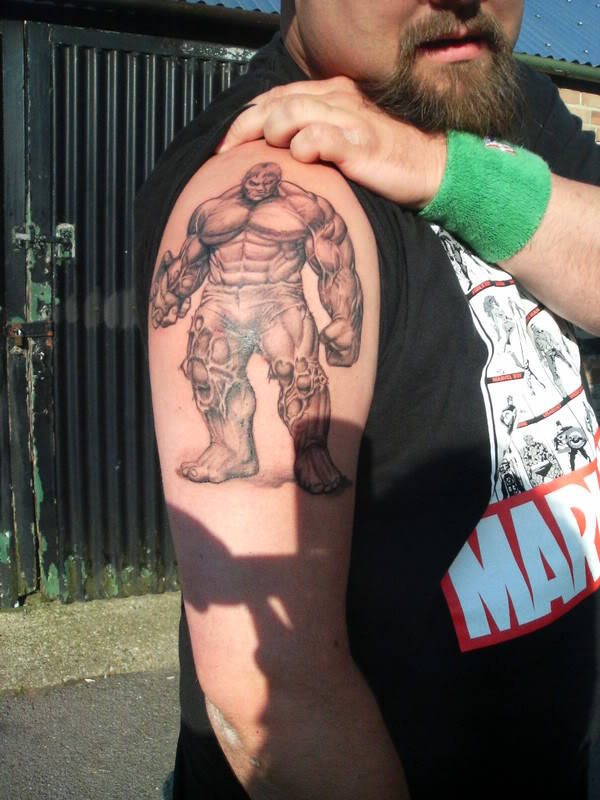 Black And Grey Hulk Tattoo On Man Right Shoulder