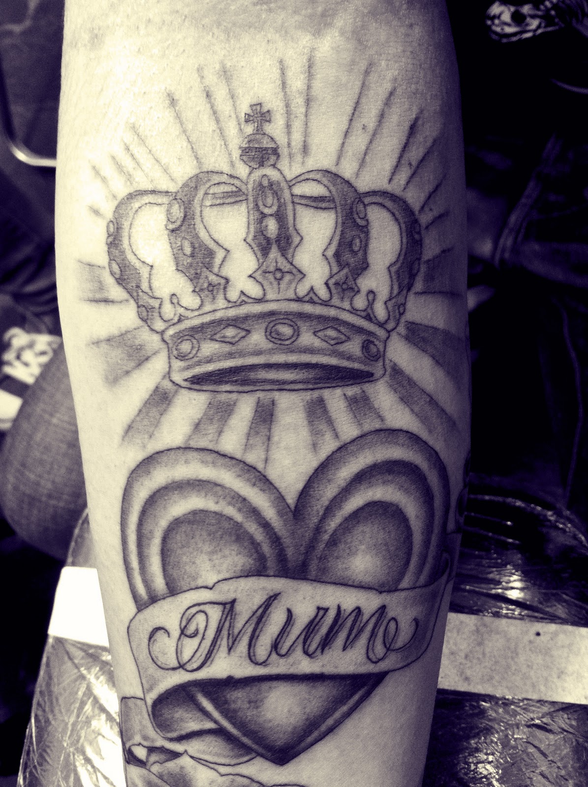 Black And Grey Queen Crown And Heart With Banner Tattoo Design For Forearm