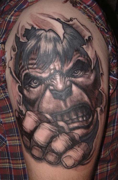 Black And Grey Ripped Skin Hulk Tattoo On Shoulder