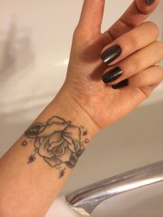 Black And Grey Rose Tattoo On Girl Wrist