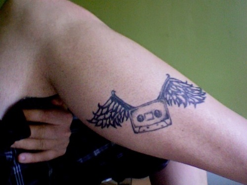 Black Cassette With Wings Tattoo On Leg