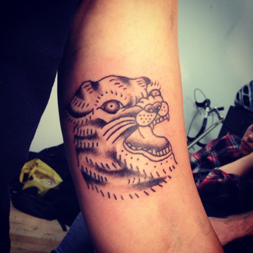 Black Ink Bobcat Head Tattoo On Half Sleeve