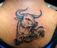 Black Ink Taurus Head With Banner Tattoo On Upper Back