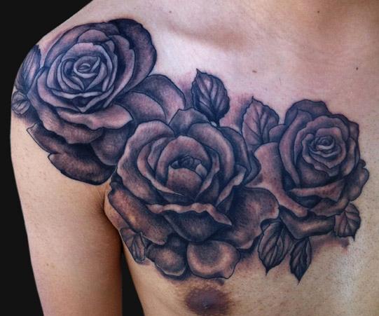Black Ink Three Roses Tattoo On Man Right Front Shoulder