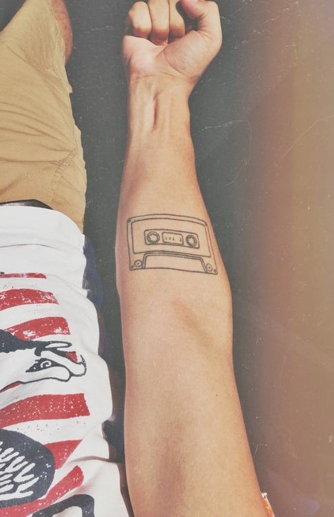 Black Outline Cassette Tattoo On Right Forearm