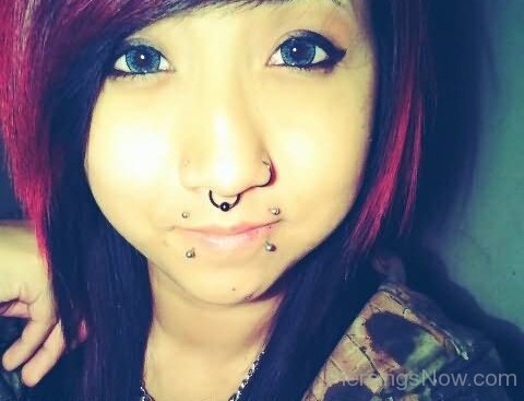 Black Septum Ring And Dolphin Bites Piercing Pictures