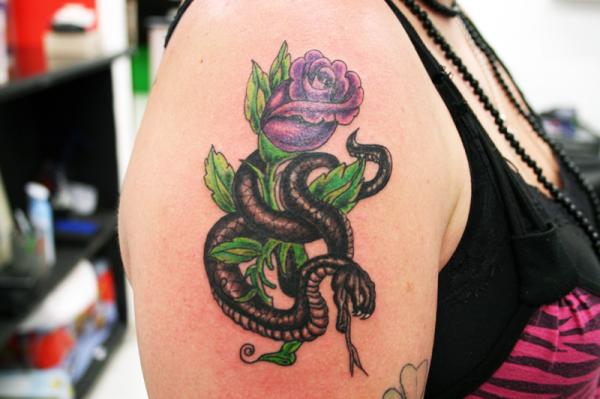 Black Snake With Purple Rose Tattoo On Girl Right Shoulder