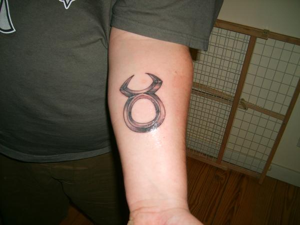 Black Taurus Symbol Tattoo On Forearm
