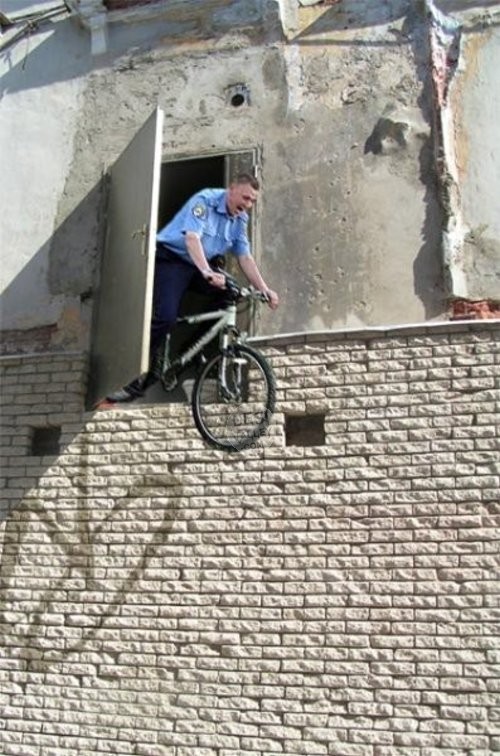 Cop Jumping With Bicycle Funny Picture