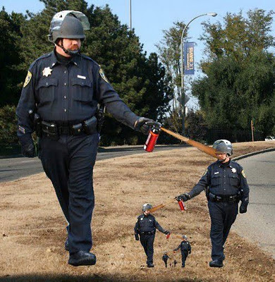 Cop Spraying Funny Photoshopped Picture