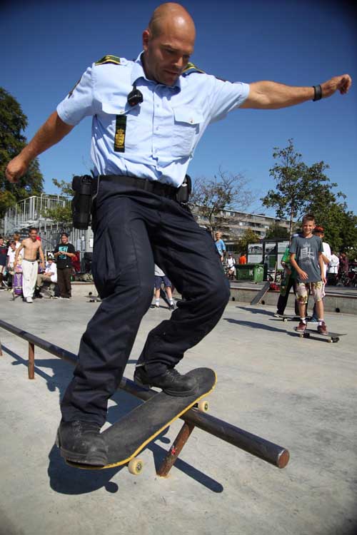 Cop With Skateboard Funny Image