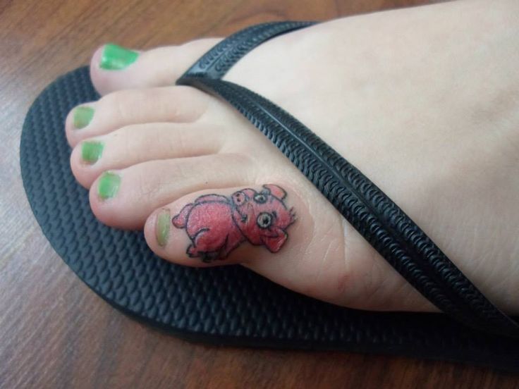 Cute Baby Pig Tattoo On Foot Finger