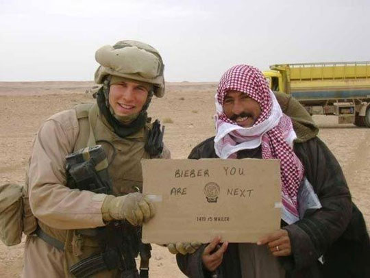 Funny American Soldier With Iraqi Man