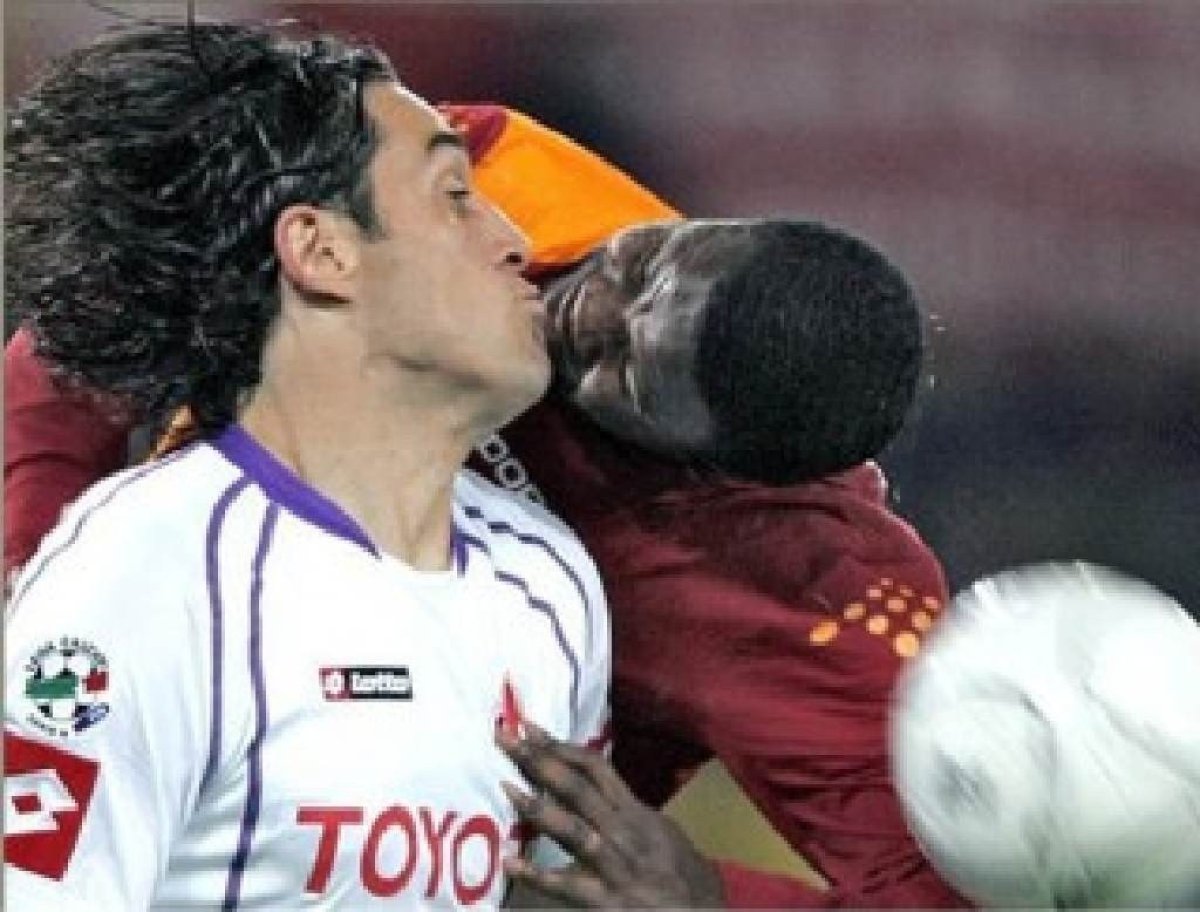 Funny Soccer Players Kissing Picture