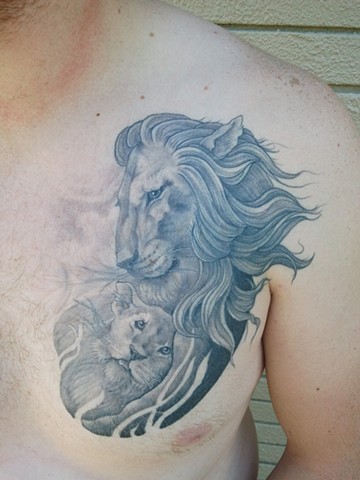 Lion With Cub Tattoo On Man Chest
