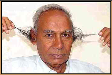Man Pulling Own Ears Hair Funny Picture