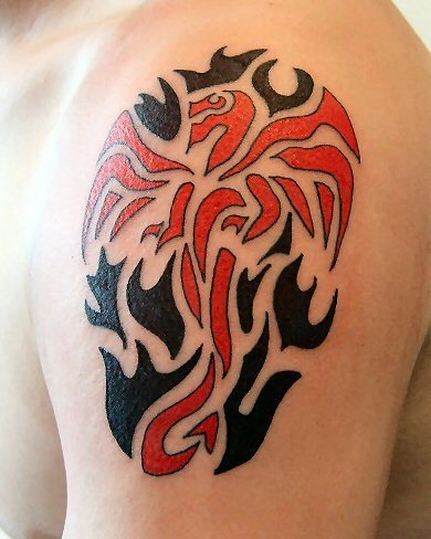 Red And Black Tribal Hawk Tattoo On Shoulder
