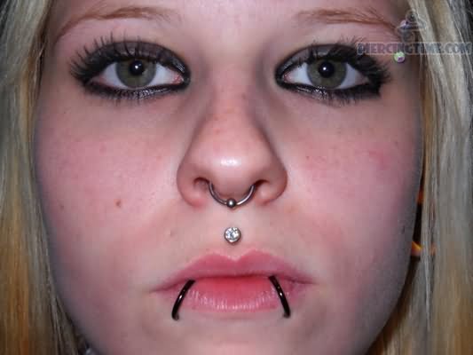 Septum Nose With Medusa Piercing And Dolphin Bites Piercing