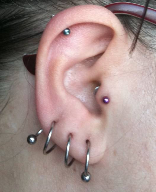 Spiral Ear Lobe Piercing Picture For Girls