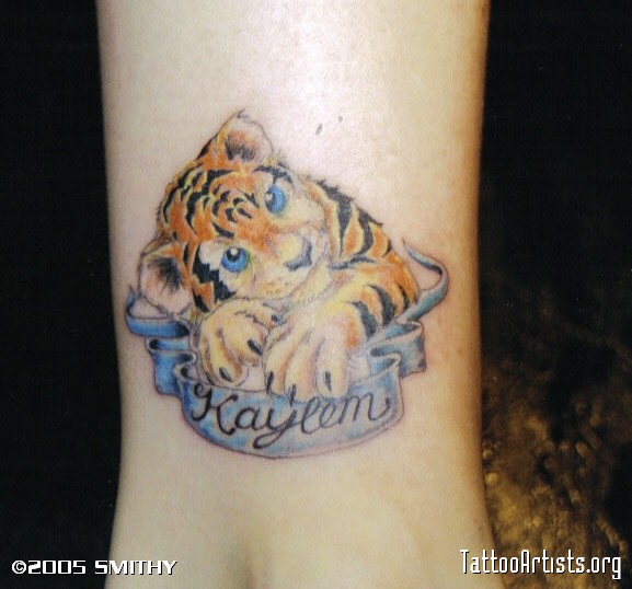 Tiger Cub With Banner Tattoo Design For Forearm