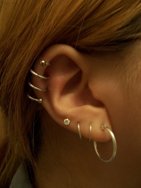 Triple Ear Lobes And Spiral Piercing Picture For Girls