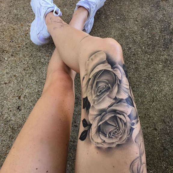 Two Grey Ink Roses Tattoo On Right Thigh