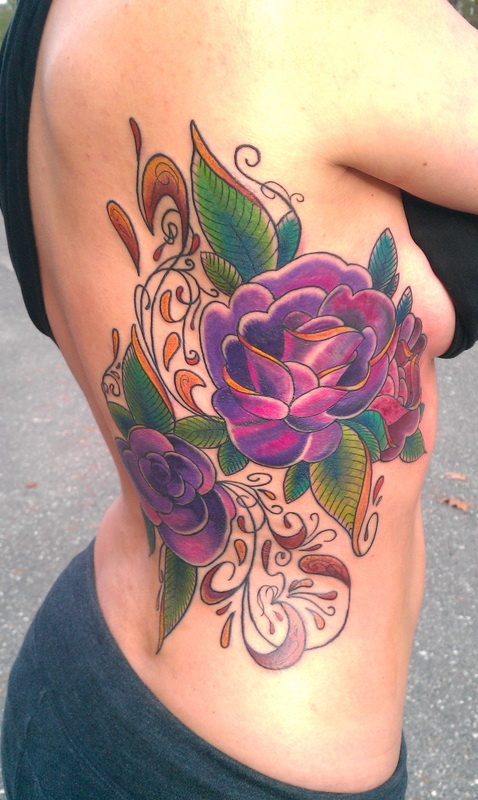 Two Purple Roses Tattoo On Girl Side Rib By Mike Sedges