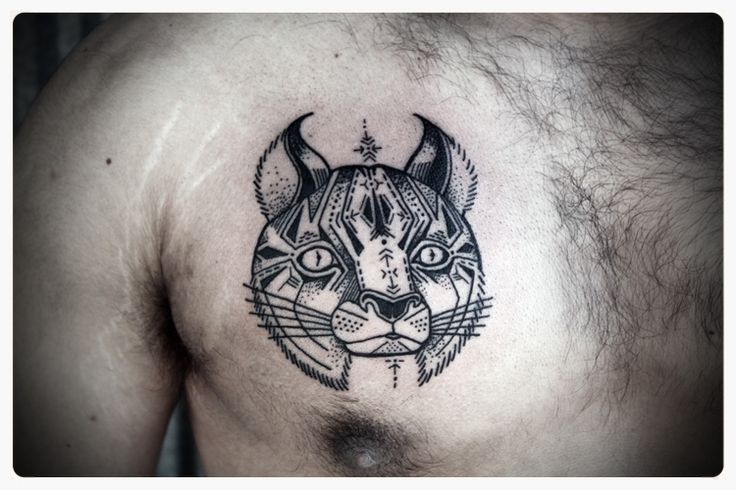 Unique Black Bobcat Head Tattoo On Man Chest