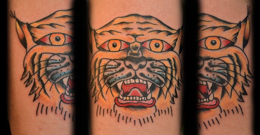 Unique Colorful Bobcat Head Tattoo Design