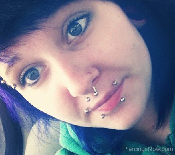Woman With Nice Septum And Canine Bites Piercing