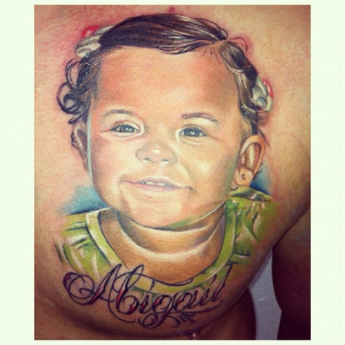 Abigail - Colorful Baby Portrait Tattoo On Man Chest