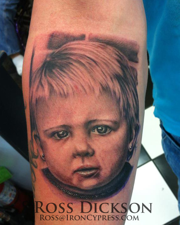 Amazing Baby Portrait Head Tattoo On Forearm By Ross Dickson