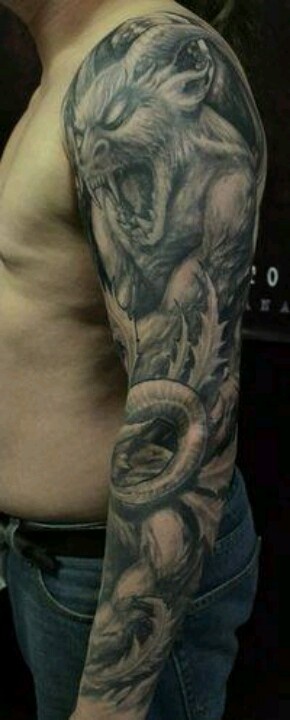 Amazing Black And Grey Gargoyle Tattoo On Man Left Full Sleeve