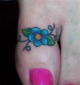 Amazing Flower Tattoo On Girl Toe