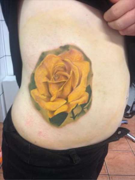 Amazing Yellow Rose Tattoo On Side Rib