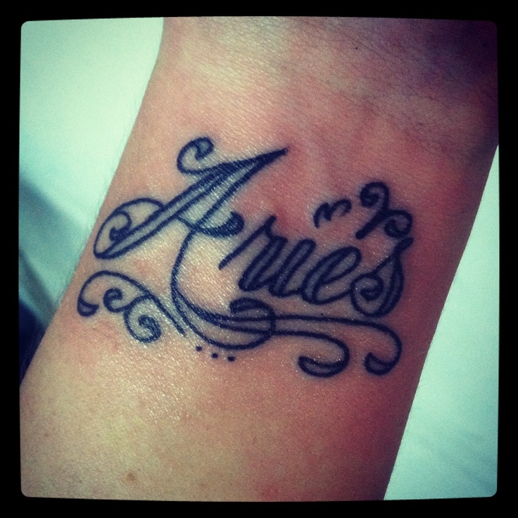 Aries Lettering Tattoo On Wrist