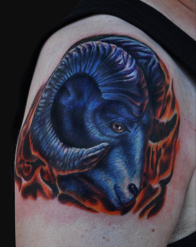 Awesome Blue Ink Aries Head Tattoo On Right Shoulder