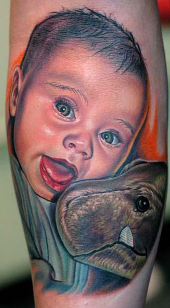 Awesome Colorful Baby Portrait Tattoo Design For Forearm