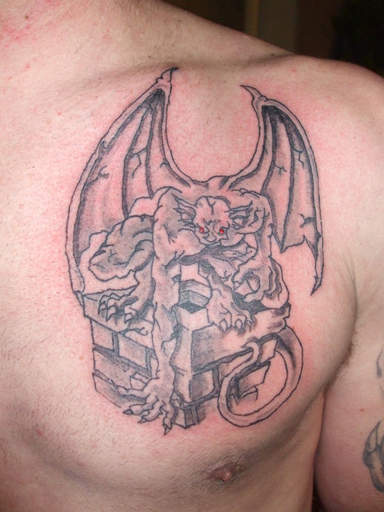 Awesome Gargoyle Tattoo On Man Chest By NobleInkSlingers.