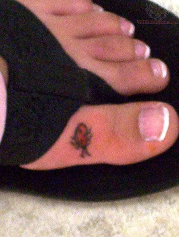 Awesome Ladybird Tattoo On Toe