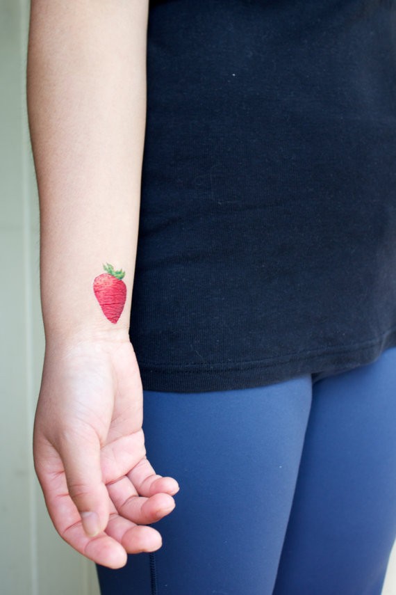 Awesome Strawberry Tattoo On Girl Right Wrist