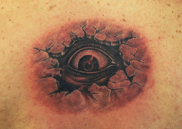 Awesome Torn Skin Eye Tattoo Design
